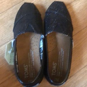 NWT Tom’s black sparkle shoes size toddler 12